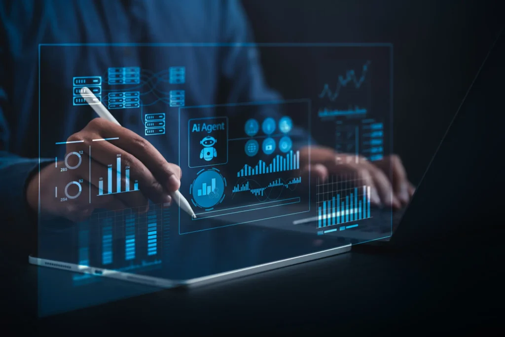 Person interacting with a transparent digital interface above a laptop.